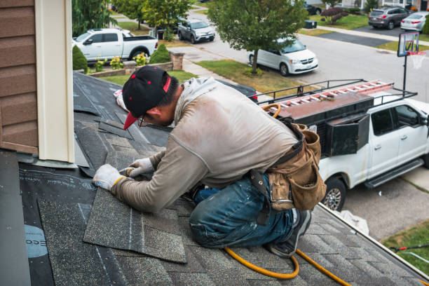Professional Roofing technician working in Seneca, OR